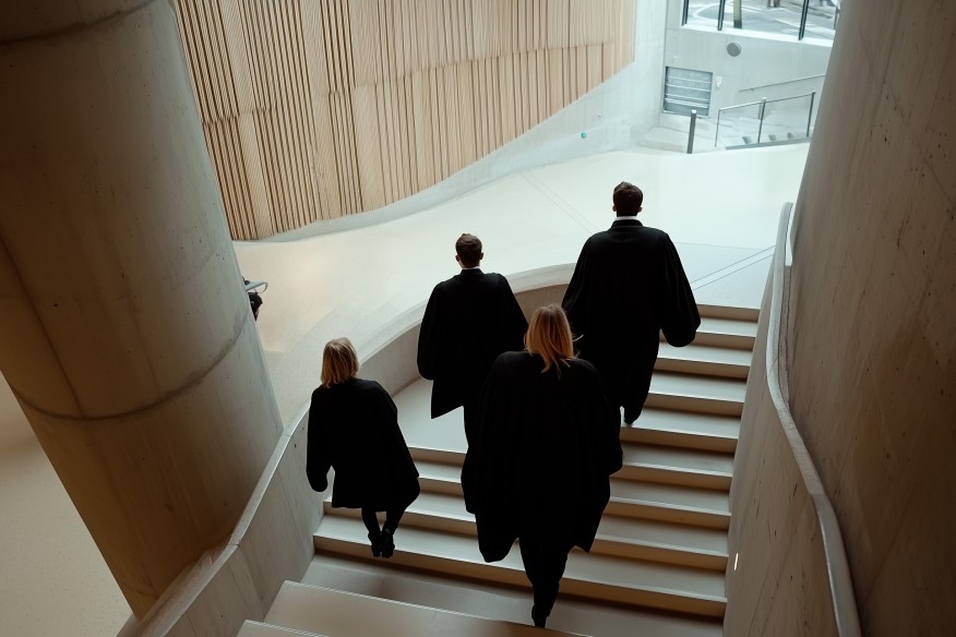 Lawyers walking up stairs